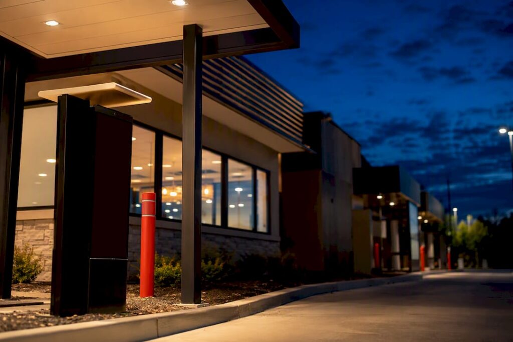 Unbranded drive-thru restaurant at dusk
