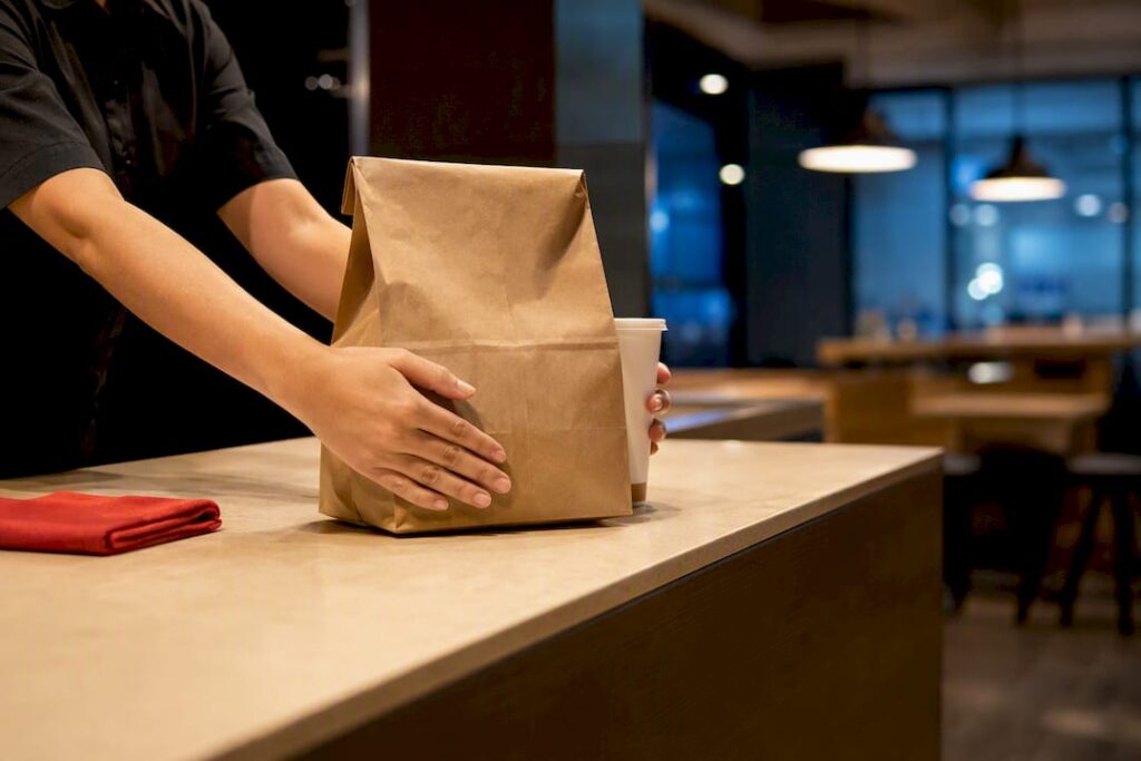 Takeaway order crossing restaurant service counter